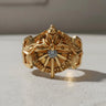 Front view of gold vermeil Silver Lucii Ring featuring a central gem and intricate mechanical details for fantasy gamers