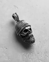 Close-up of a 925 sterling silver bearded skull pendant, highlighting the gothic biker style and handcrafted details.