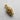 Gold vermeil bearded skull pendant showcasing the intricate hair texture of the beard and the ribbed knit beanie design.