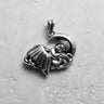 Oxidized 925 sterling silver sleeping angel pendant showing a detailed cherub on a cloud with a crescent moon background.