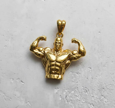 Gold-plated version of the bodybuilder fitness pendant, displaying the intricate muscular detail with a brilliant shine.
