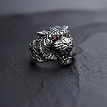 Handcrafted 925 sterling silver tiger head ring showcasing the intricate fur texture along the band and snarling expression.