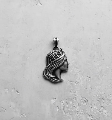 Oxidized 925 sterling Silver Queen Pendant in black and white, highlighting the artisan craftsmanship and textured relief.