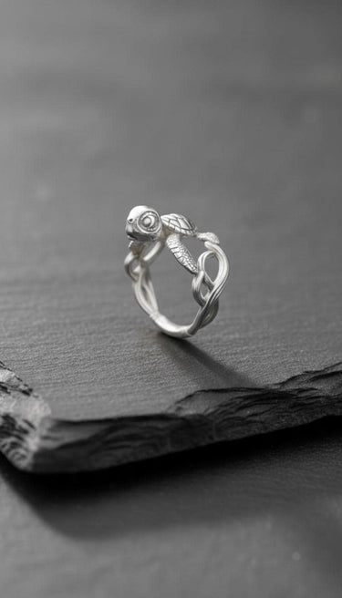 Side profile of the 925 sterling Silver Turtle Ring, showcasing the adjustable woven band and the turtle's head detail.