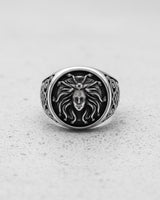 Front-on view of the handcrafted 925 sterling silver Medusa ring, highlighting the detailed snakes in her hair and oxidized finish.
