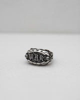 Top-down view of the 925 sterling silver War Ring, showcasing the detailed blackletter typography and ornate band details.