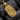 Angled view of handcrafted silver skull necklace showing texture and depth of skull motifs