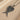 Detailed view of angel wings pendant design showcasing realistic feather texture and craftsmanship