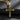 Front view of silver black cross pendant showing pointed edges and stone detail