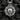 Back view of silver pendant displaying intricate geometric spoke design and high-quality finish