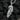 Close up view of avian jewelry design showing swirling acanthus leaf patterns and sharp beak features on pendant
