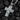 Gold plated sterling silver crucifix pendant on charcoal background highlighting religious details