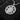 Angled view of oxidized silver Slavic mythology necklace with intricate solar wheel background