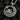 Gold plated silver mosque pendant with crescent moon and star symbols displayed on charcoal texture