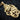Rose gold plated theater mask pendant with intricate high-relief craftsmanship and design