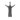 Silver Jesus pendant standing upright on a white surface, showing the detailed carvings of the Passion symbols on the robe.