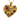 Gold vermeil cracked heart pendant with red gemstones on textured black slate background