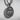 Close-up of handcrafted oxidized silver Saint Jude pendant highlighting intricate religious metalwork design