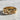 Botanical Leaf Ring, gold vermeil, front view on stone surface