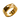 Gold vermeil piston ring featuring recessed grooves and circular cutouts displayed on a textured white background