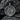 Close-up of London landmarks pendant on dark rocky texture highlighting intricate 3D architectural details