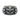 Front view of the silver demon skull ring, showcasing the central demonic face and flanking skulls on a dark slate.