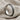 Split twisted ring, oxidized silver, standing profile view showing inner band