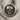 Round Skull Signet Ring, oxidized silver, top overhead view on linen