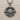 Travel Compass Pendant, oxidized, product photo on fabric