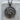 Rose Bouquet Pendant, oxidized, front view on stone pedestal