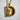 Close-up shot of the intricate carved bird and flower details on the handcrafted letter D initial pendant
