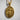 Close-up of gold vermeil Saint Uriel pendant revealing exquisite craftsmanship of the angel's flame and scroll