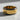 Close-up of the True For True ring resting on a textured surface, highlighting the crisp typography and oxidized silver.