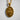 Close-up of the Saint Therese of Lisieux medallion pendant highlighting the crucifix and rose details in gold vermeil
