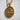 Detailed view of the Christian motherhood medallion showing intricate textured background and sacred figures.