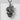 Close-up detail of the oxidized silver snake head and textured scales on the Rod of Asclepius pendant