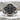 Macro detail of the handcrafted Orthodox cross ring resting on stone displaying the dark oxidized silver finish.