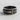 Warrior Spear Ring, oxidized, product photo on textured surface