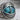 Turquoise dragon eye ring, oxidized silver, angled close-up of eye motif