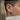 Ribcage Skull Hoop Earring, oxidized, worn on model ear