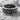 Overlapping Dragon Scale Ring, oxidized silver, front view on rock surface