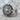 Compass Anchor Ring, oxidized, angled view on stone