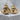 Snake All-Seeing Eye Cufflink, gold vermeil, side view on stone