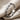 Happy Face Disc Ring, oxidized, angled view on fabric