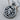 Scorpio Zodiac Medallion Pendant, oxidized, angled view on wood surface with chain