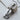 Steampunk Guitar Pendant, oxidized matte silver on wood surface