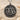 Capricorn Zodiac Medallion Pendant, oxidized, product photo on sand