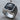 Snarling Wolf Signet Ring, oxidized silver, angled studio product photo