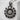 Bloom sunflower pendant, oxidized silver, front view on concrete block
