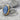 Kyanite Falcon Hood Ring, two-tone finish, three-quarter view product photo